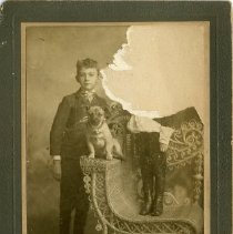 Two Unidentified Children and a Dog